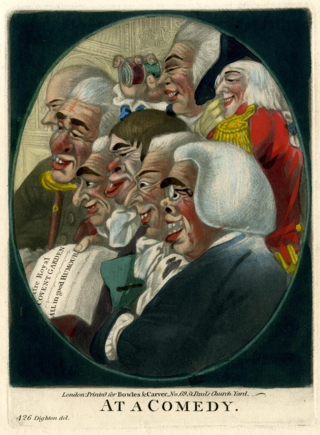 Eine Gruppe von Menschen, die lachend in einem Kreis stehen und sich an den Händen halten, wobei eine Person ein Blatt Papier hält, auf einem Comedy-Event.