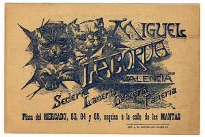 Alte Visitenkarte mit einem Foto von zwei Katzen und begleitendem Text.