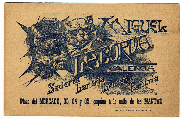 Alte Visitenkarte mit einem Foto von zwei Katzen und begleitendem Text.